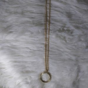 Goldtone chain with loop.